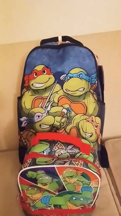 sprayground backpack with lunchbox.